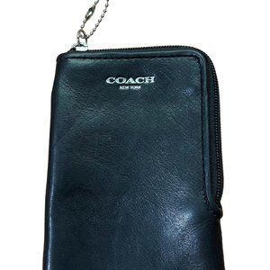 Beautiful black coach wallet 5.5 “ x 3.5” with a zipper